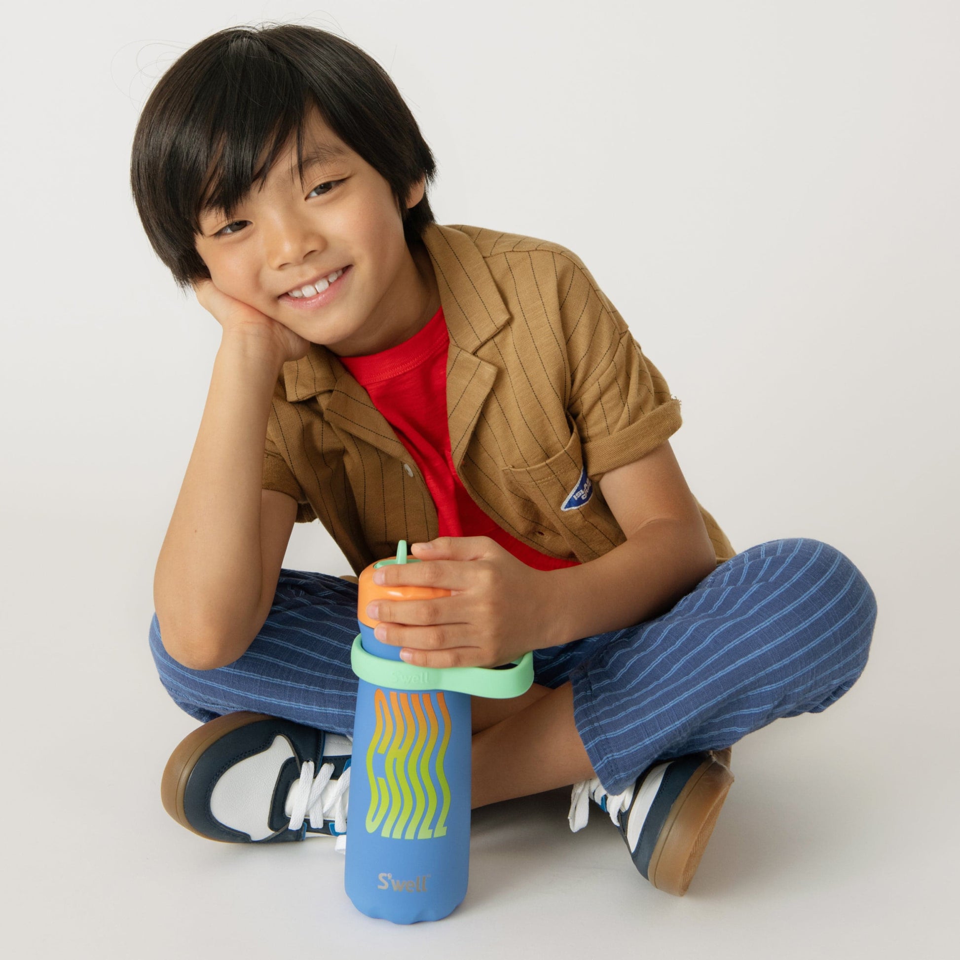 traveler-with-flip-straw-lid-16oz-u2 Swell-Kids-Water-Bottle-Traveler-16oz-Blue-Chill-Lifestyle.jpg